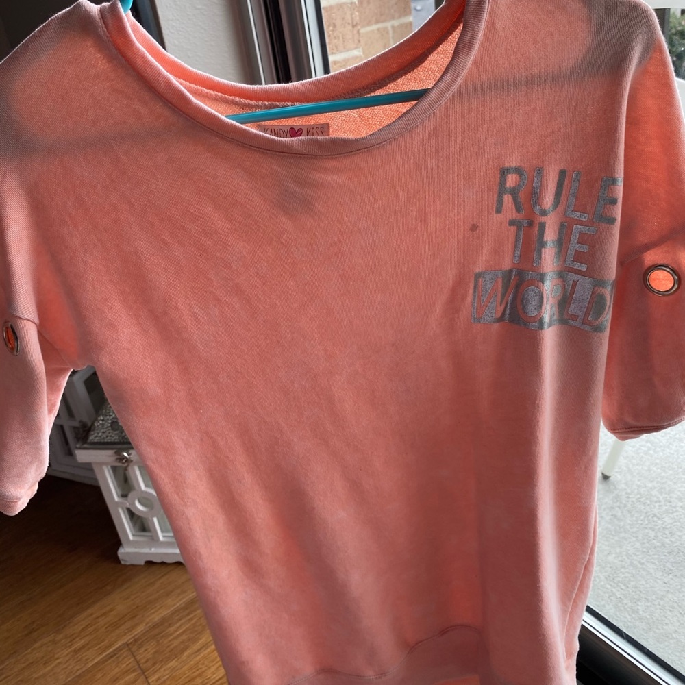 Over sized shirt with with holes in the sleeves